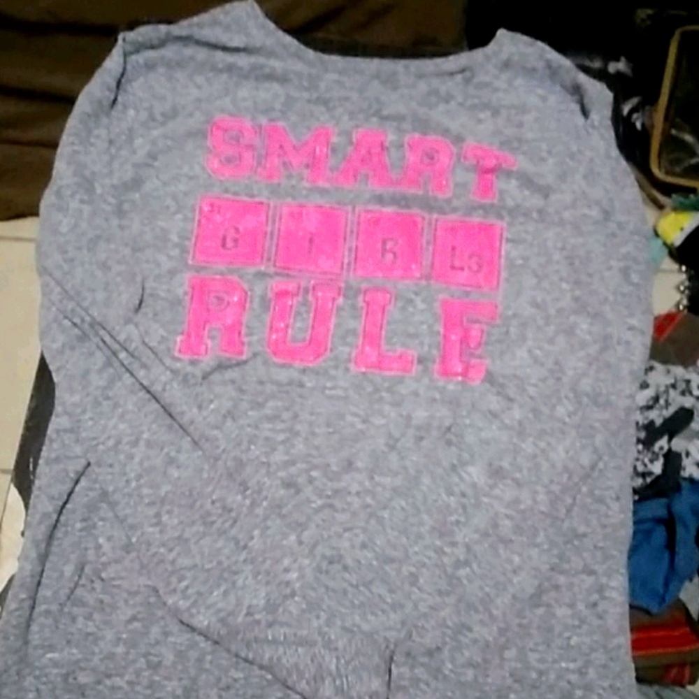 A long sleeve top that says smart G I R Ls Rule